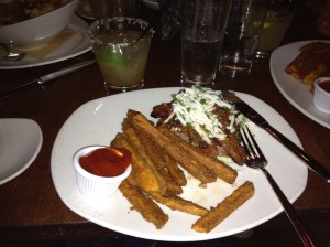 A nice meal out. Bunless burger, with bacon and some cheese. Fries and ketchup! And...a margarita. Yum.